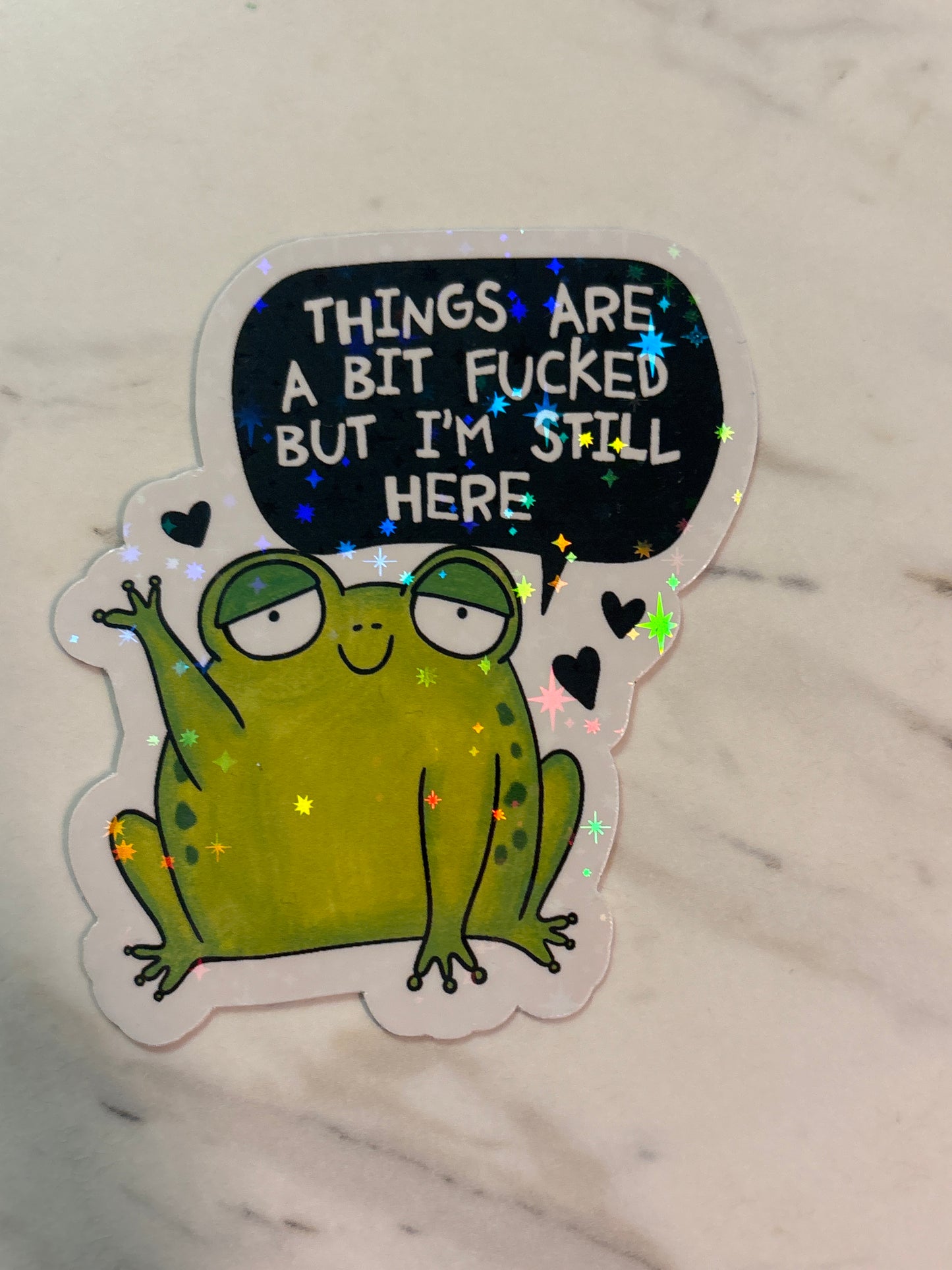 Things are a bit f*ed but I’m still here. Frog Sticker